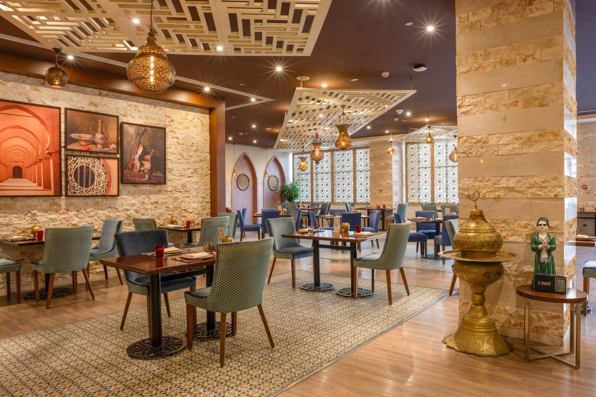 فندق تريامف لاكشري القاهرة المظهر الخارجي الصورة Restaurant