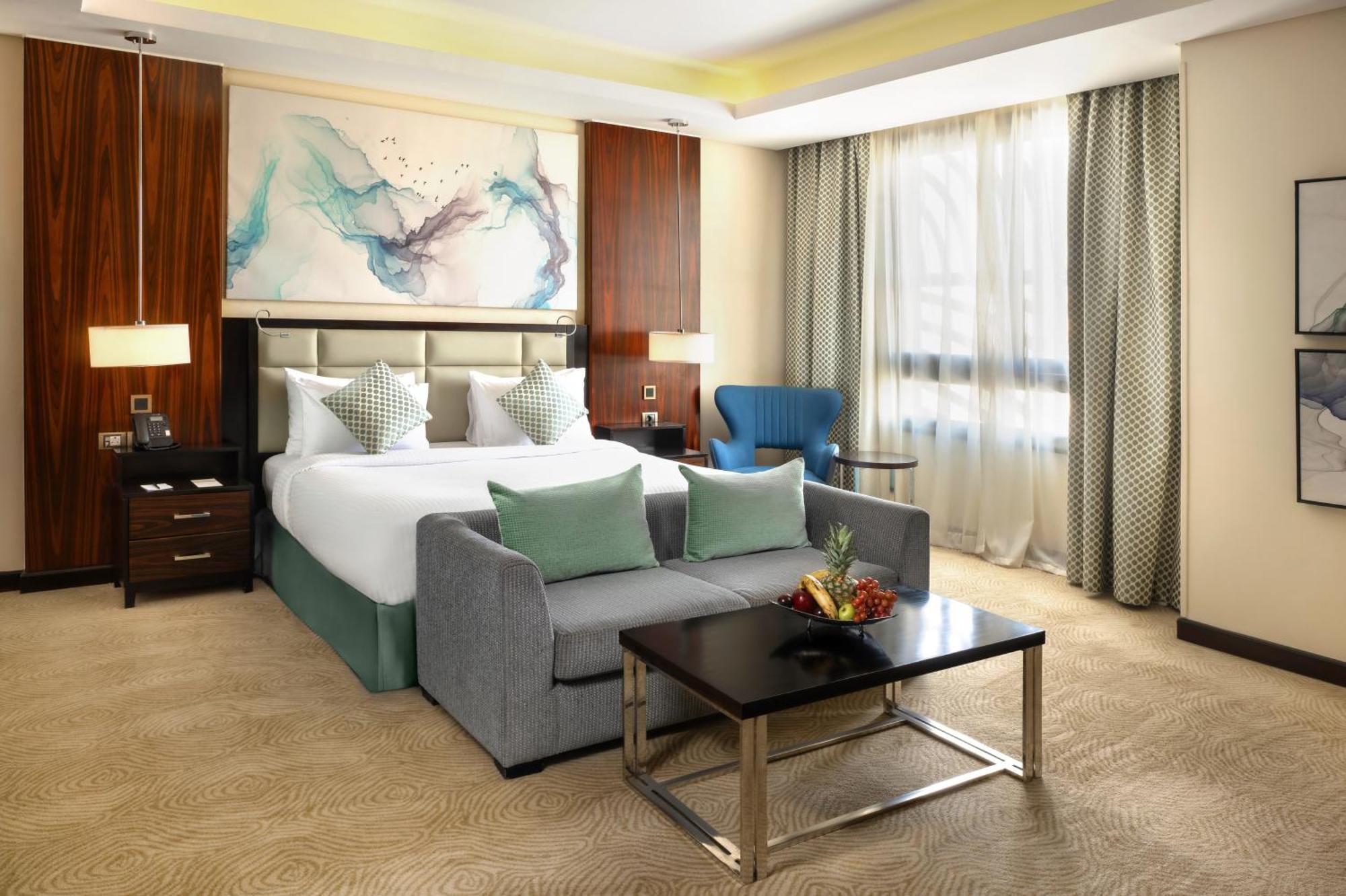 فندق تريامف لاكشري القاهرة الغرفة الصورة A room at the hotel