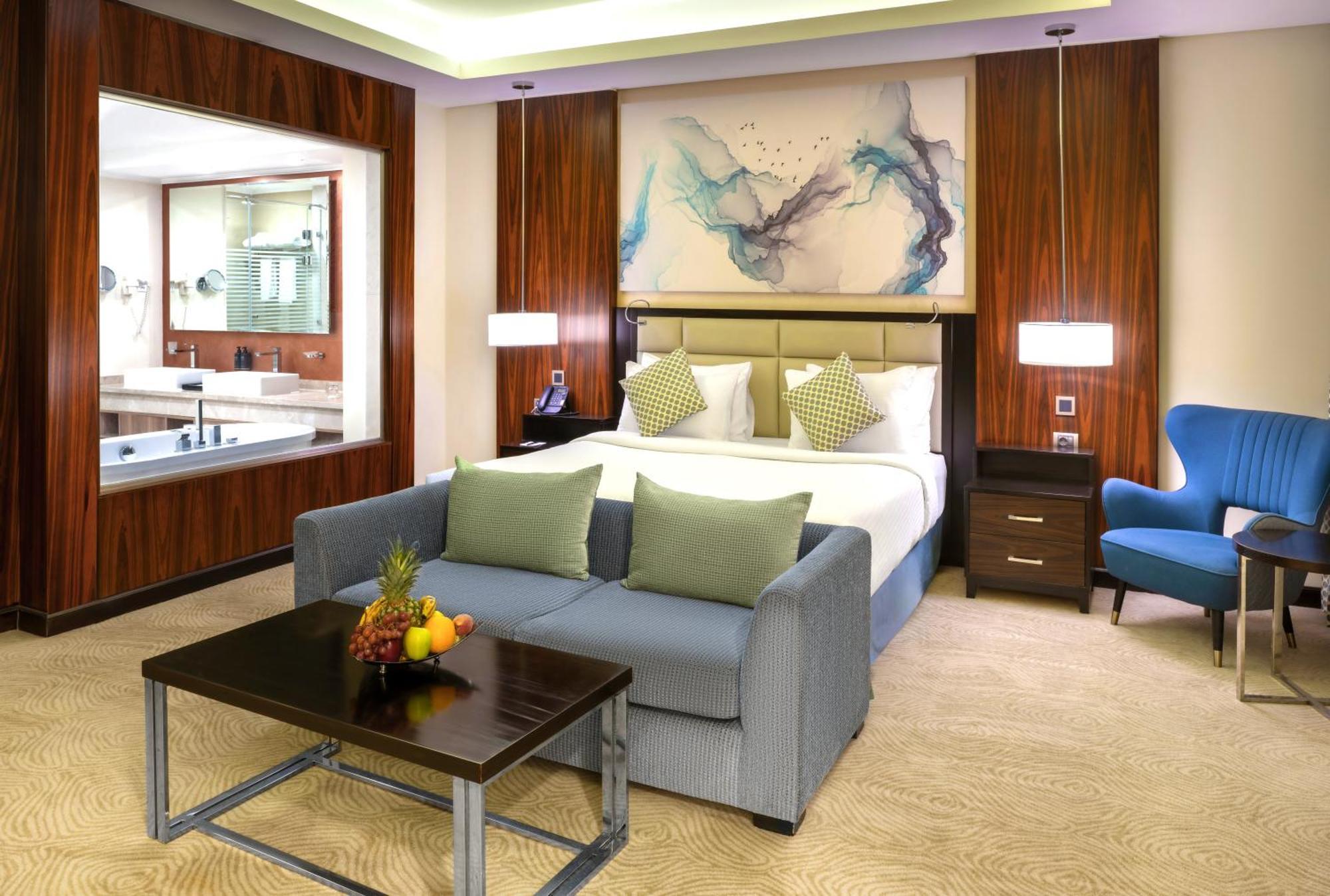 فندق تريامف لاكشري القاهرة الغرفة الصورة A suite at the hotel